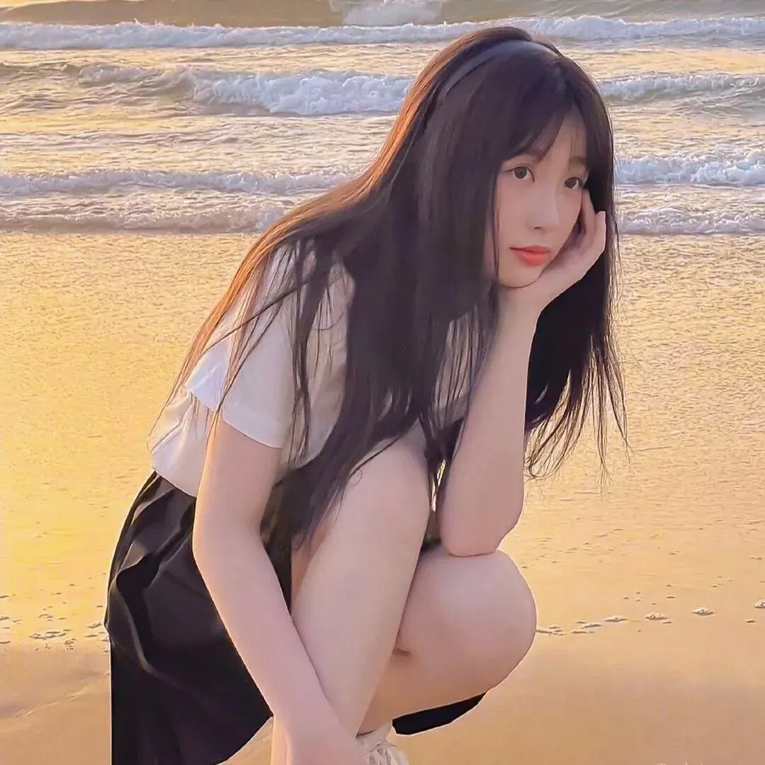 照片的她